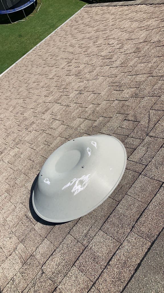 Metal roof vent cap with multiple hail dents